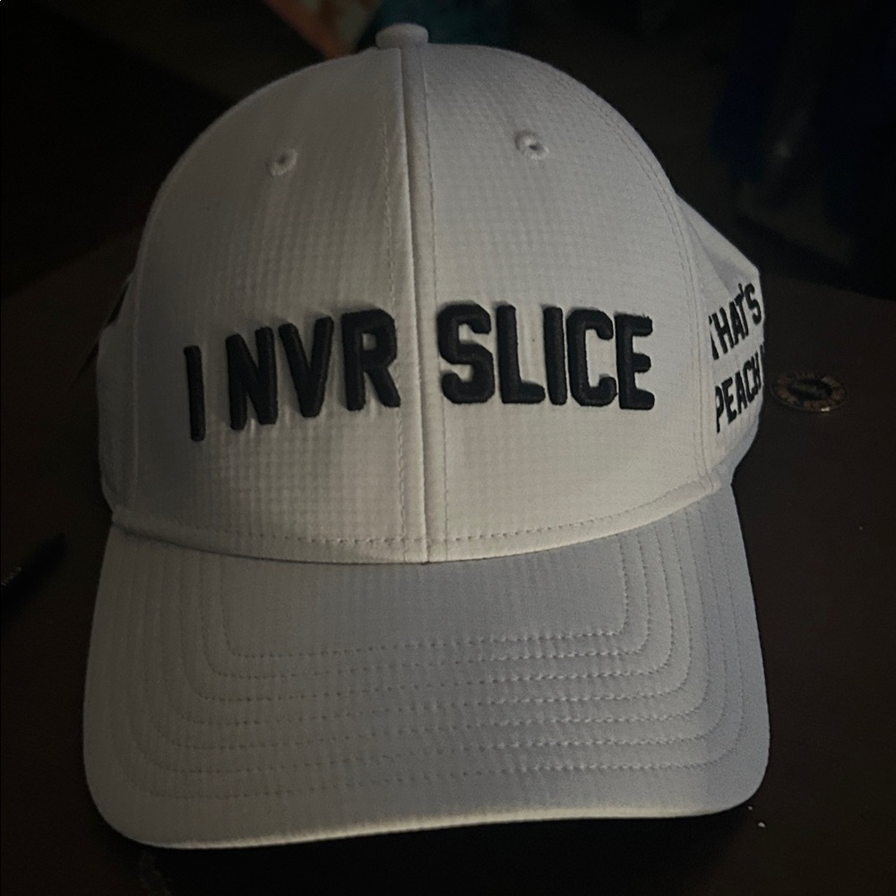 TaylorMade “I NVR SLICE”White Cap with Black Embroidery
